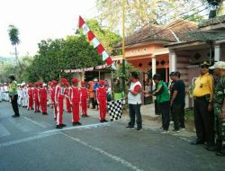 Babinsa dan Bhabinkamtibmas Manding Pengamanan Gerak Jalan Dalam Rangka HUT RI Ke-73