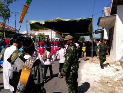 Serma Junaidi Batituud Ramil 0827/04 Bluto Pimpin Pengamanan Kegiatan Lomba Gerak Jalan