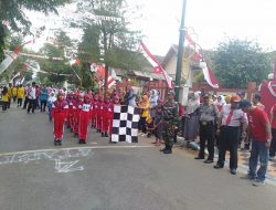 Serka A. Kusfandi Lepaskan Lomba Gerak Jalan di Wilayah Koramil 0827/13 Rubaru