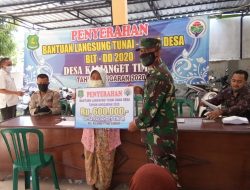 Babinsa Koramil 0827 Kalianget Melakukan Pendampingan Pendistribusian BLT