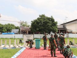 Menyambut Hari Pahlawan, Personel Kodim 0827 Bersih Makam TMP