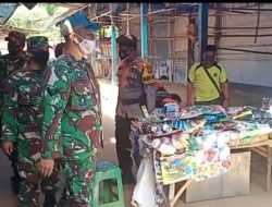 Babinsa dan Bhabinkamtibmas Laksanakan Operasi Yustisi Di Pasar Tradisional