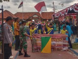 Memperingati HUT RI ke-77, Babinsa Koramil 19 Sapeken Bersama Camat Lepas Peserta Lomba Karnaval