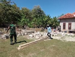 Satgas TMMD 121 Bantu Turunkan Material Kayu Untuk RTLH Masiya