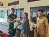 Babinsa Koramil 01/Kota Dampingi Penyaluran Bantuan Beras di Desa Bangselok
