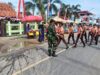 Babinsa Ambunten Amankan Lomba Gerak Jalan Tingkat Sekolah