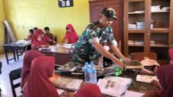 Babinsa Batuputih Kawal Distribusi Makanan Bergizi Gratis ke Sekolah-sekolah
