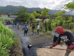 Satgas TMMD 127 di Sumenep Wujudkan Jalan Aspal Desa Terpencil